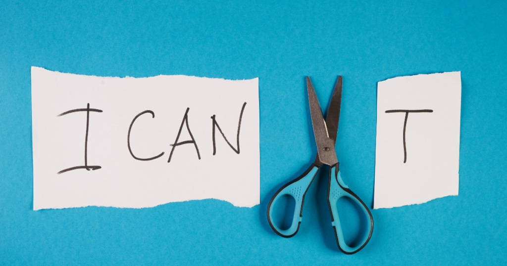 Scissors separate words 'I can' and 't'.